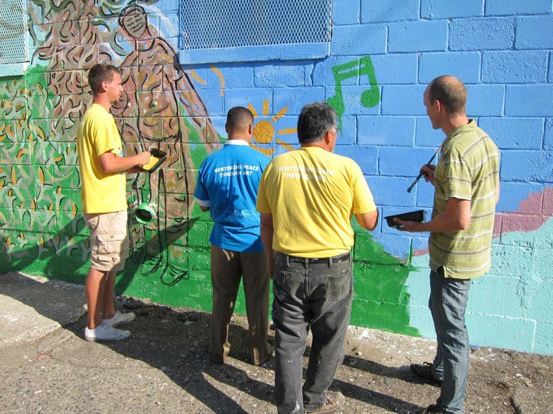 U.S. Congressman Keith Ellison and Minneapolis City Councilmember Gary Schiff being mentored by Peter and Jimmy